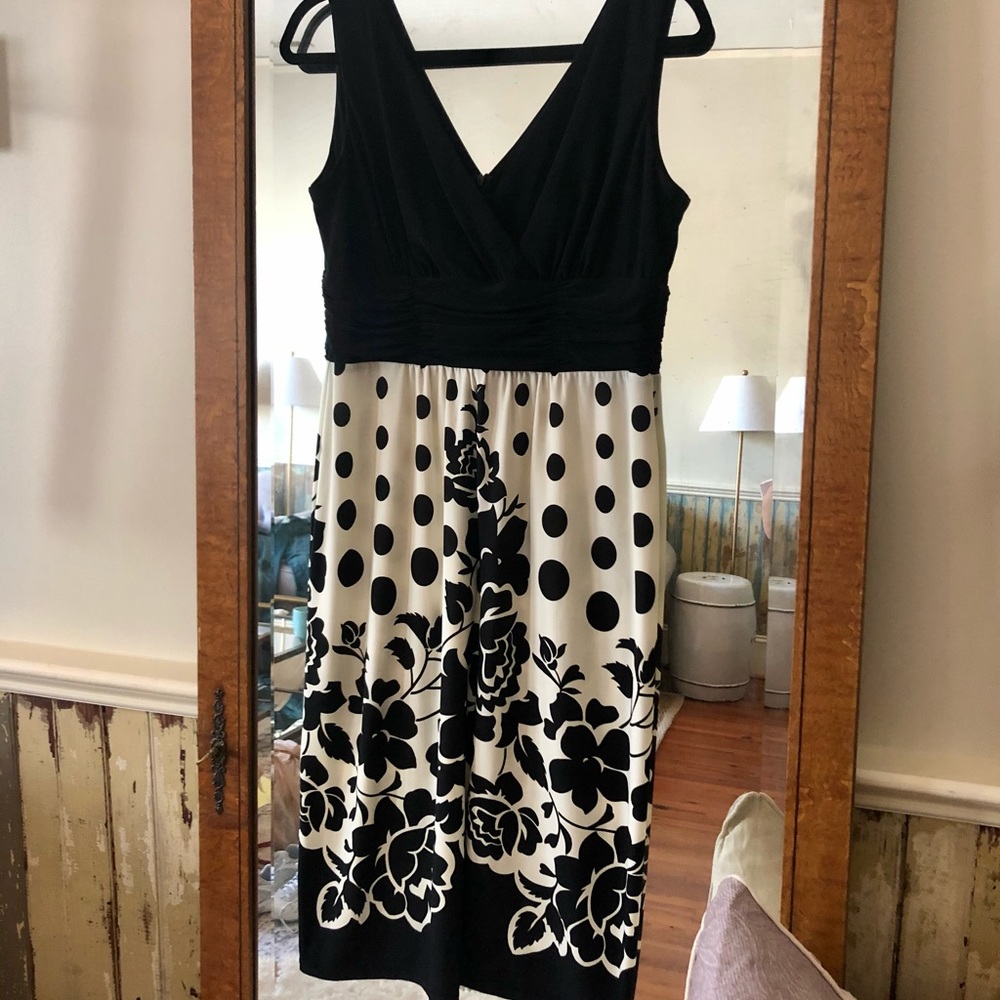 Classic, goes anywhere black and white dress.